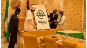 President Buhari,  CBN Governor , Godwin Emefiele  during launch of the e Naira at Abuja 