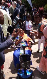 Ekaete Umoh using disability aid at UN Headquarters in New York 