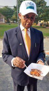 Counselor for Agricultural Affairs Gerald Smith during a taste-test of the prepared Bt Cowpea at the event