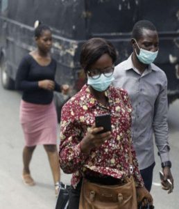 Mask-wearing Nigerians