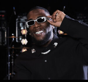 Teni, Burna Boy Receive Award From President