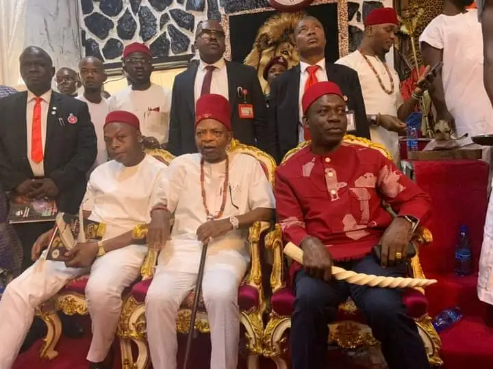 Prince Arthur Eze (centre) and Governor Soludo in red Isiagu (traditional dress for high chiefs) holding the Odu Mkpa-alo (horn made of elephant tusk) at the last Ofala Festival in Dunukofia