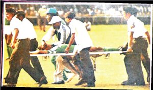 okwaraji carried out of pitch