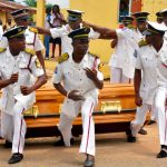 Undertakers dancing with casket on their way to the burial site Abiriba Abia State nigeria