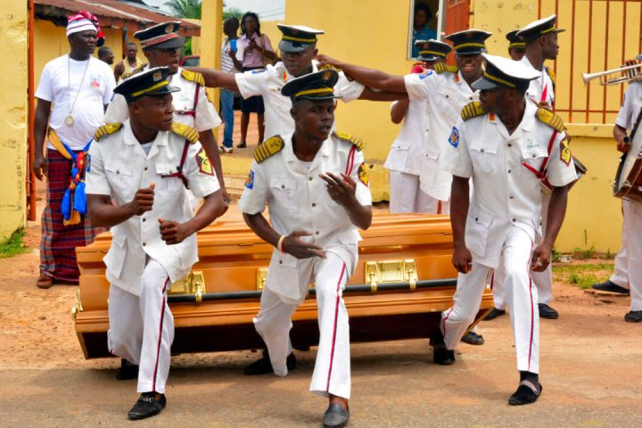 Undertakers dancing with casket on their way to the burial site Abiriba Abia State nigeria