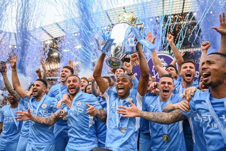 Manchester City Football Club team celebrates with Premier League trophy championship May ()