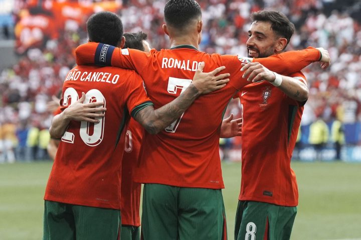 Cristiano Ronaldo and Bruno Fernandes after the former set up the latter against Turkey