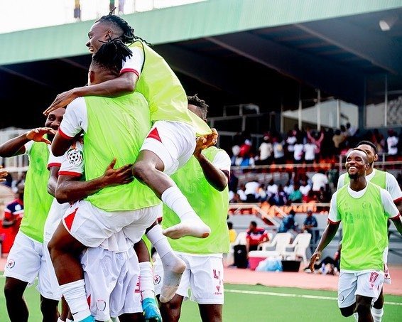 Rangers players celebrate afte edging Bendel Insurance to win league title