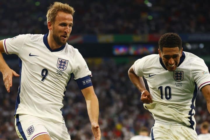 England Captain Harry Kane and Jude Bellingham celebrate after victory over slovakia