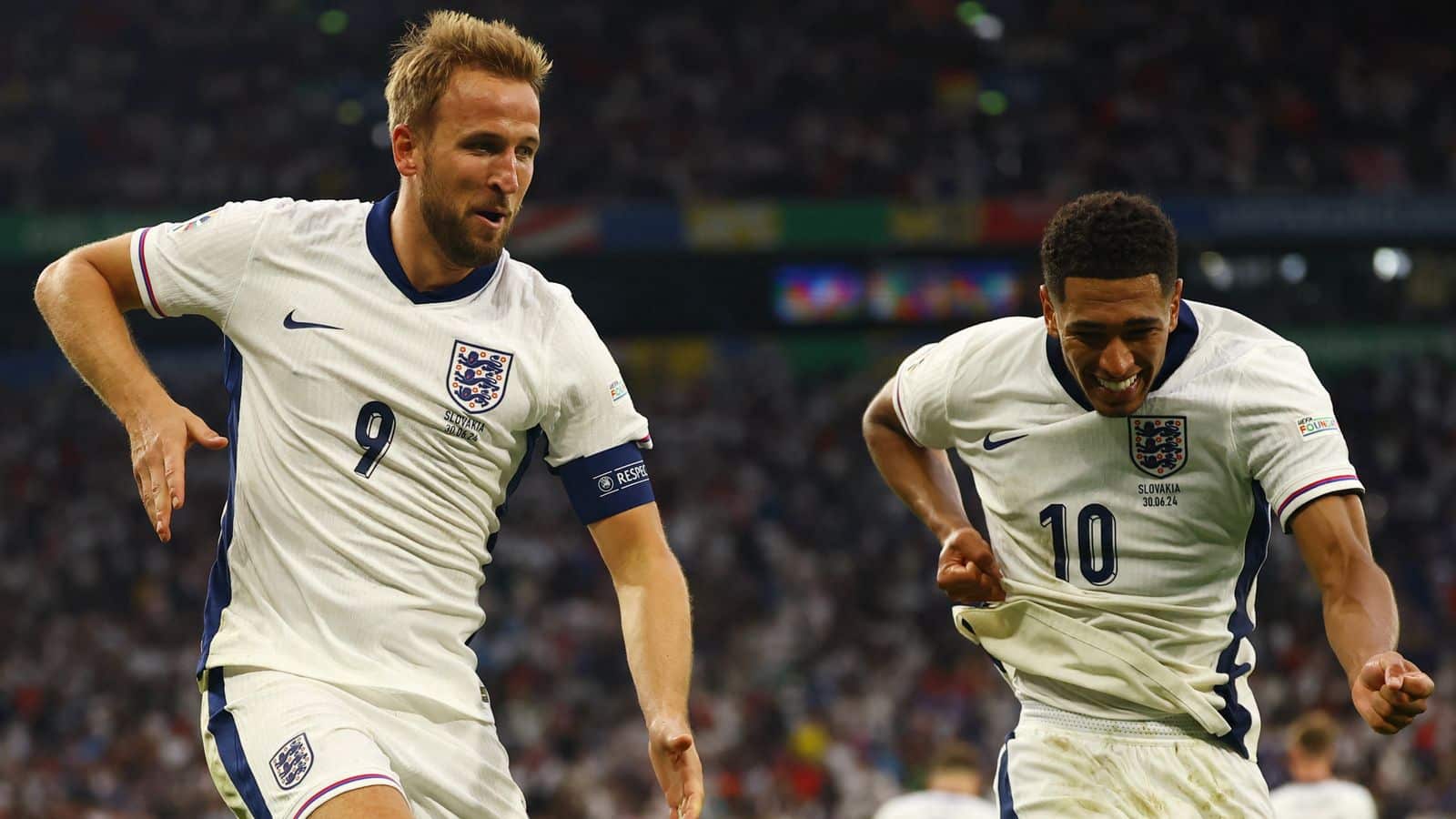 England Captain Harry Kane and Jude Bellingham celebrate after victory over slovakia