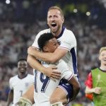 England Captain Harry kane celebrates with goal scorer Olie Watkins