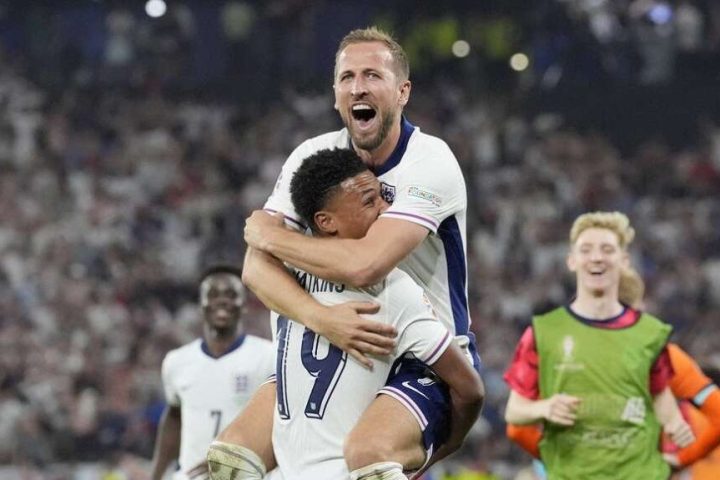 England Captain Harry kane celebrates with goal scorer Olie Watkins