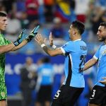 Uruguay’s goalkeeper Sergio Rochet celebrates with teammates after defeating Canada