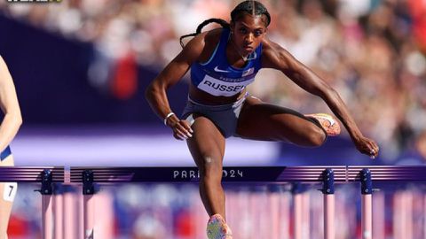 America's Masai Russell wins m Hurdles Gold