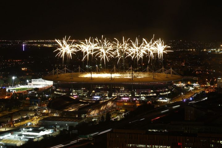 Fireworks explode above the Stade de France