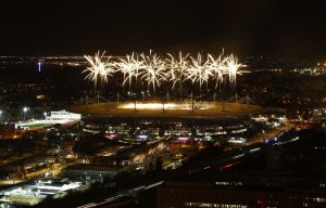 Fireworks explode above the Stade de France