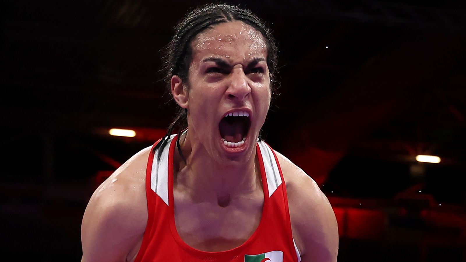 Imane Khelif of Team Algeria celebrates victory against Anna Luca Hamori of Team Hungary after the Women's kg Quarter final round match on day eight of the Olympic Games Paris