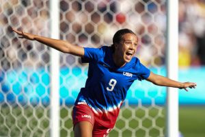 Mallory Swanson of the United States celebrates scoring a goal against Brazil