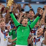 Manuel Neuer lifts the FIFA World Cup trophy with his German national teammates