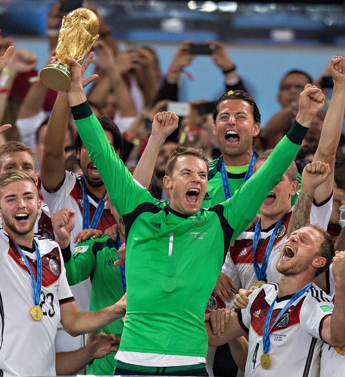 Manuel Neuer lifts the FIFA World Cup trophy with his German national teammates