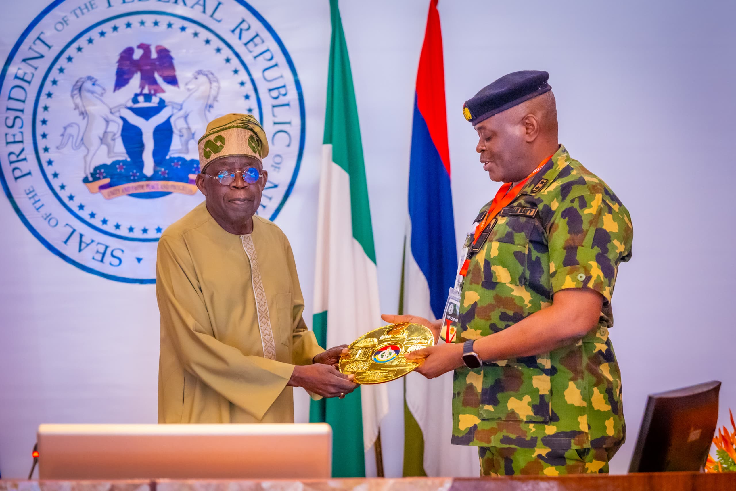 Tinubu with National Defence College official