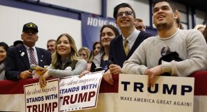 Supporters listen to a speech by Republican presidential candidate Donald Trump at a rally at the Great Bay Community College, Thursday, Feb. 4, 2016, in Portsmouth, N.H. (AP Photo/Robert F. Bukaty)