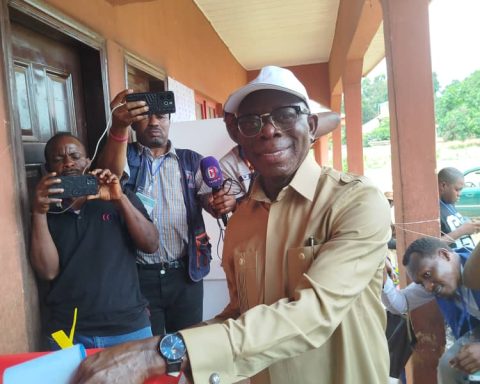 senator adams Oshiomhle casting his vote