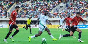 Nigeria's Victor Boniface battle Libyans during the encounter friday