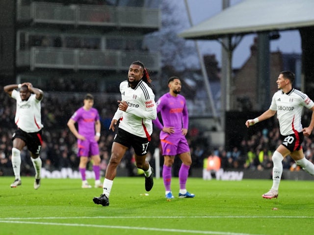 Fulham's Alex Iwobi reacts after scoring opening goal