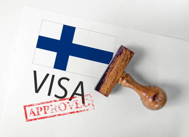 Finland Visa Approved with Rubber Stamp and flag