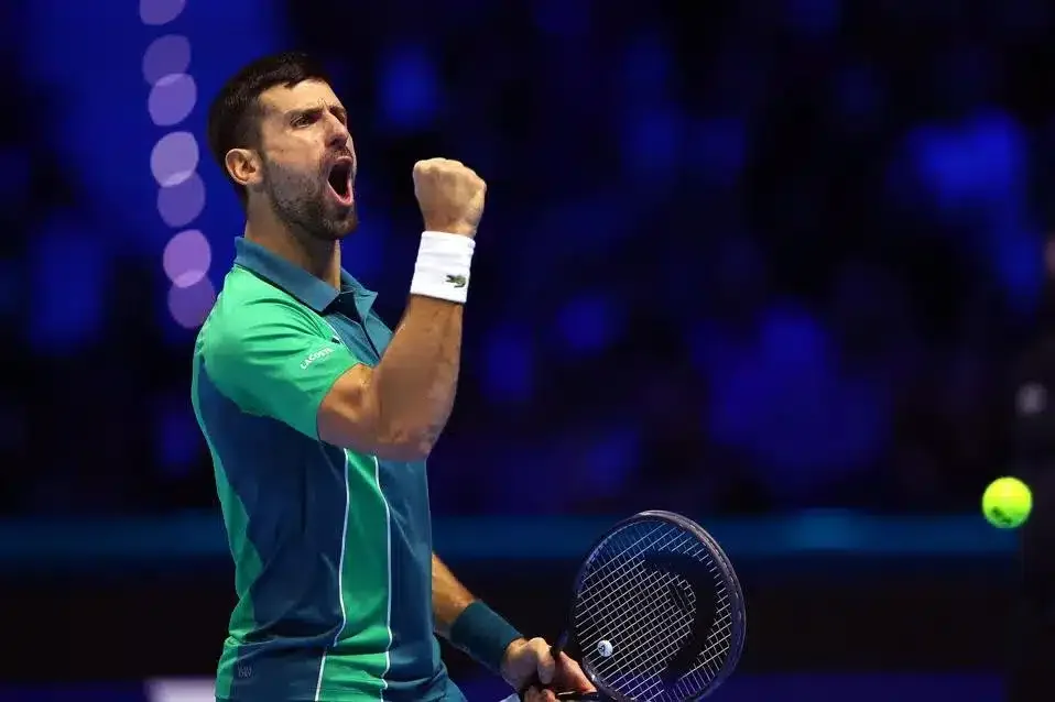 Novak Djokovic reacts after a good delivery