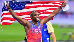 US sprinter Noah Lyles celebrates after winning m Gold at the Paris Olympics