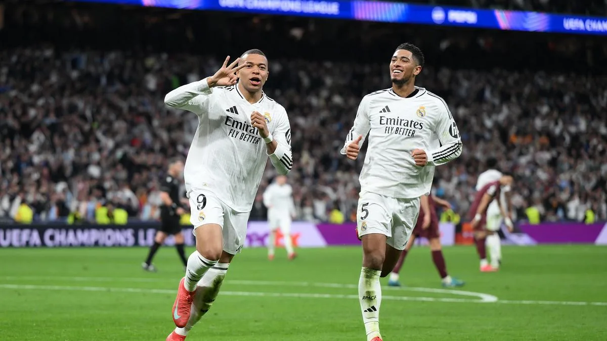 Real Madrid forward and hat trick hero Kylian Mbappe celebrates Bellingham