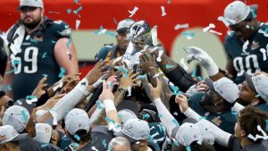 The Philadelphia Eagles celebrate with the Vince Lombardi Trophy