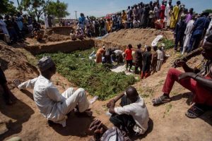 mass burial of tanker explosion victims