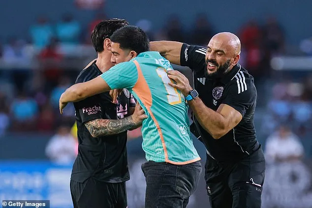 Pitch invader finally beat Chueko to hug Messi