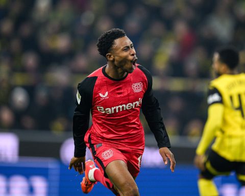 Bayer Leverkusen and Super Eagles forward Nathan Tella celebrates after scoring