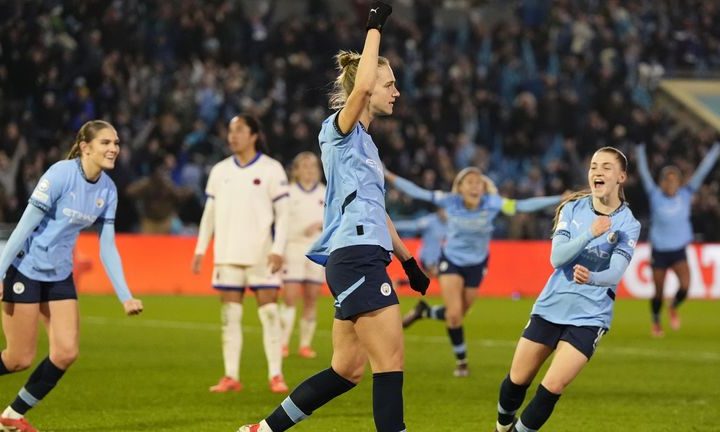 Miedema celebrates her opener before making it a brace