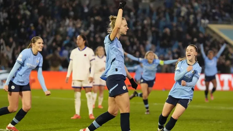 Miedema celebrates her opener before making it a brace